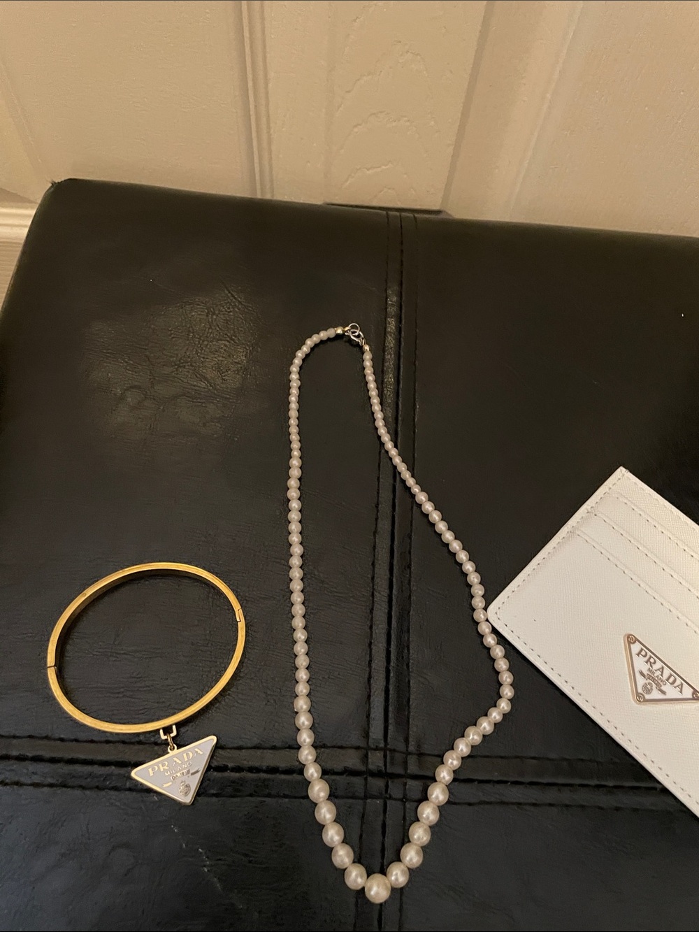 Gold logo bangle *** sold separately and white Card holder .. see listing
